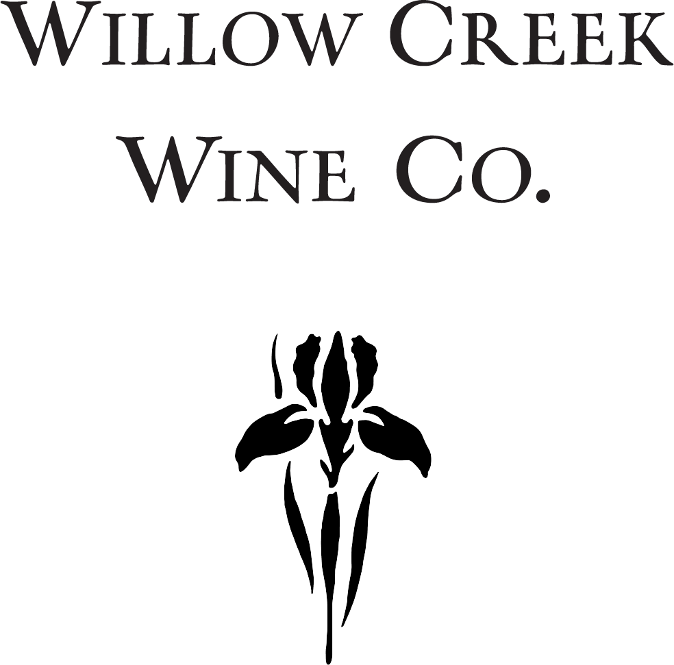 Willow Creek Wine Co. logo: large serif wordmark at the top with a black stylized iris flower beneath.