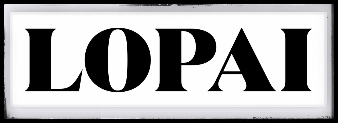 White sign with bold black letters reading 'LOPAI' on a white background.